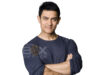 Aamir Khan Top Grossers
Inside Box Office, young man with dark hair in casual navy shirt, confident expression, crossed arms, clean background.