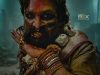 Pushpa 2 The Rule: A rage incoming for single screens in North India Dark fantasy character with intricate face paint, skull ornaments, and elaborate jewelry, creating a fierce and mystical appearance suitable for a thriller or horror film.