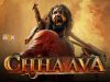 Impactful Period Drama | Vicky Kaushal’s Chhaava Movie Review 2025
Vigorous movie character wielding a weapon in a fiery, intense battle scene from the Indian film Chhhaava.