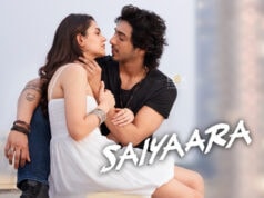 A Bollywood HIT before release ? | Mohit Suri’s Saiyaara Movie Advance Booking Report Intimate moment between a young couple with love and passion, showcasing romantic chemistry in an urban city setting for the movie Saiyara.
