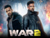 War 2 Day Wise Detailed Box Office Collection | India and Overseas Fictional image from the movie WARS 2 featuring two serious male characters in a sci-fi action setting with icy cave environment.