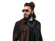 Ranveer Singh Stylish Man With Long Hair, Beard, Sunglasses, And Leather Jacket Representing Modern Urban Fashion, Perfect For Movie Or Celebrity Industry Magazine Coverage.
