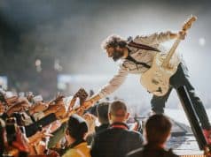 Revisit Arijit Singh Famous Songs as the Star Singer Retires
Arijit Singh interacts with fans during a live concert, showcasing his musical talent and connection with the audience.