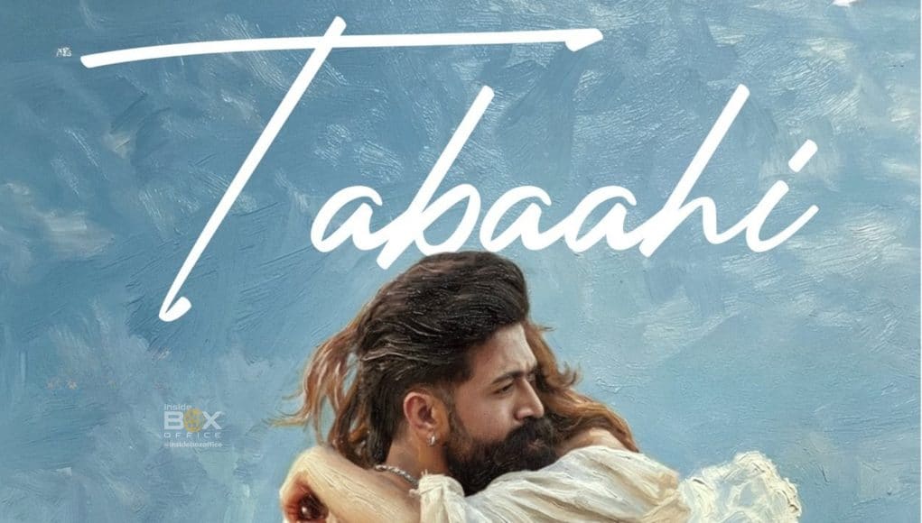 Tabahi - Indian Action Thriller Movie Poster An intense scene from the Indian action thriller film "Tabahi" featuring a man and woman embracing each other against a cloudy sky background.
