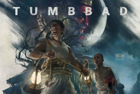 Tumbbad 2018 Review – A Cult Classic That Stands The Test Of Time An Atmospheric Poster Of The Indian Horror-Fantasy Film Tumbbad, Showcasing The Main Characters With A Dark, Eerie Background And A Large Moon, Emphasizing The Film'S Mysterious And Cult Classic Appea.